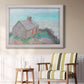 Impressionist coastal building landscape by Claude Monet in an ornate weathered white frame displayed in a light-toned interior setting.