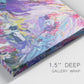Close-up view of wrapped canvas corner featuring expressive abstract with layered color.