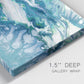 Close-up view of wrapped canvas corner featuring layered abstract marble textures.