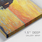 Close-up view of wrapped canvas corner featuring arched coastal cliff above sea.