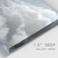 Close-up view of wrapped canvas corner featuring aerial landscape view photograph.