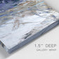 Close-up view of wrapped canvas corner featuring textured blue abstract composition.