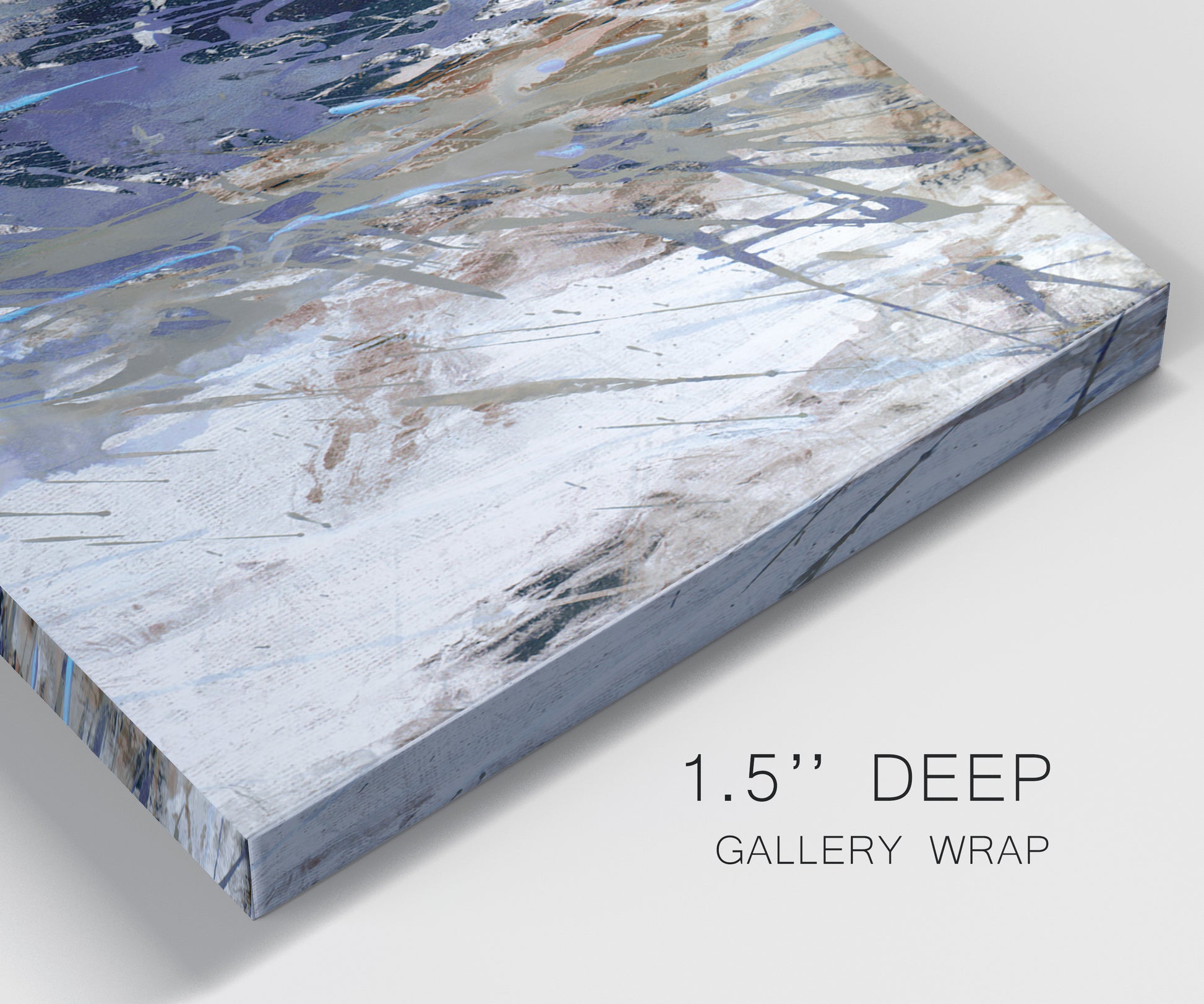 Close-up view of wrapped canvas corner featuring textured blue abstract composition.