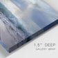 Close-up view of wrapped canvas corner featuring soft sunrise over open water.