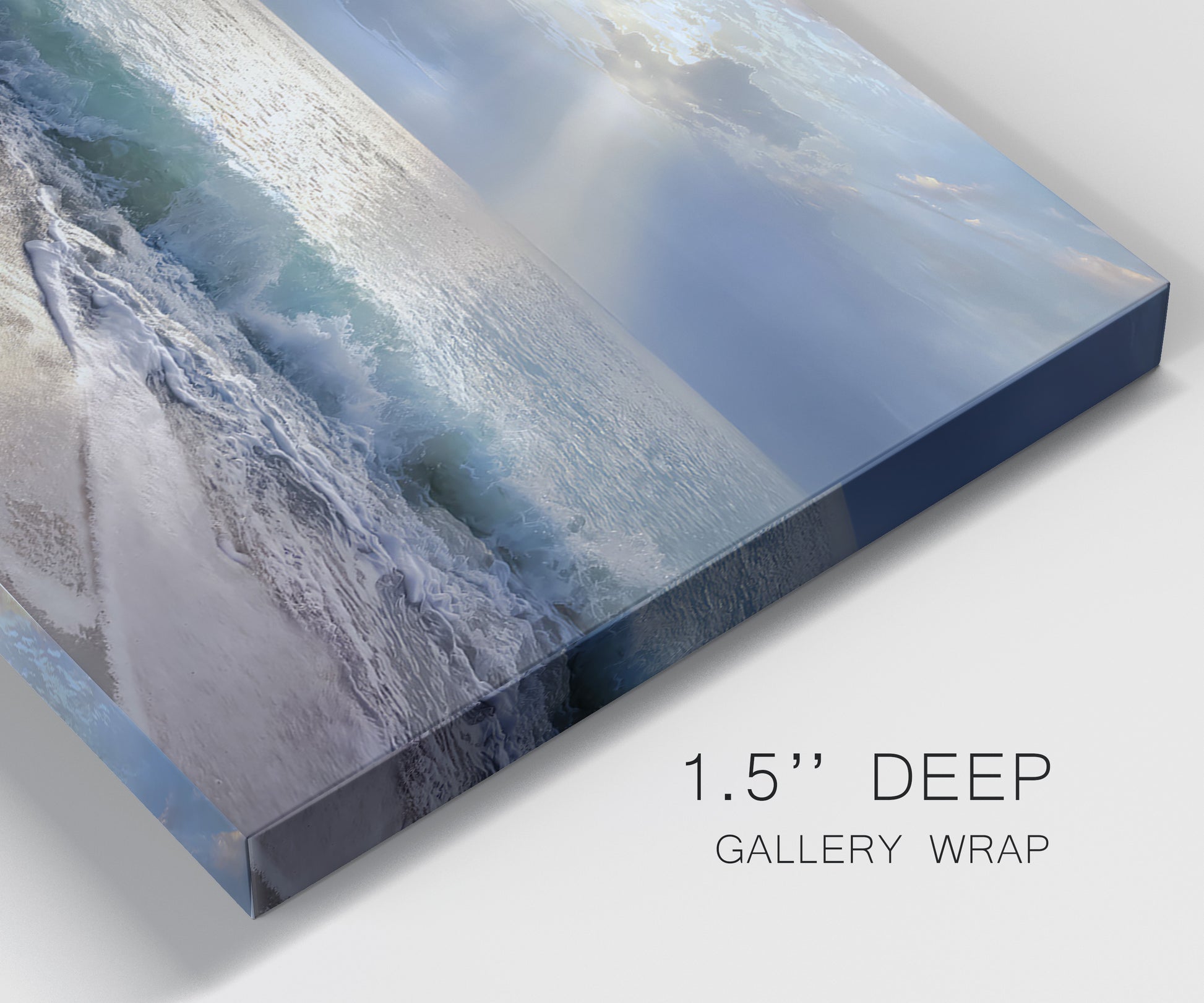 Close-up view of wrapped canvas corner featuring soft sunrise over open water.