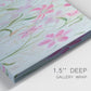 Close-up view of wrapped canvas corner featuring pink floral trio arrangement.