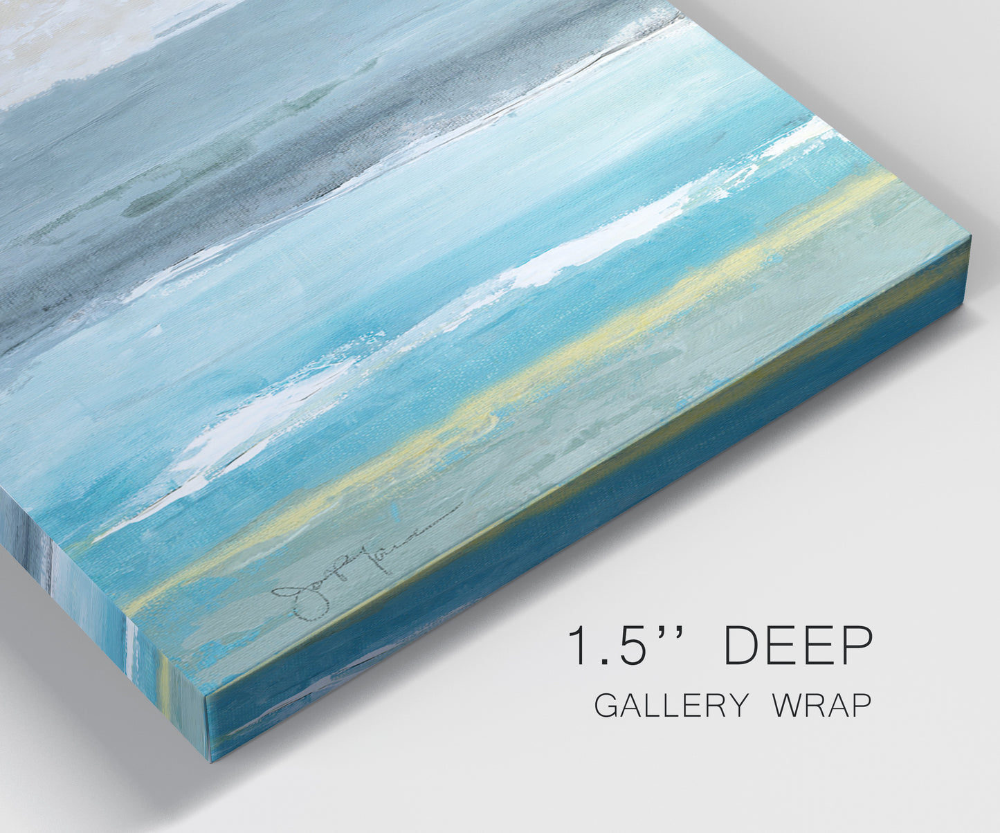 Close-up view of wrapped canvas corner featuring abstract coastal beach textures.