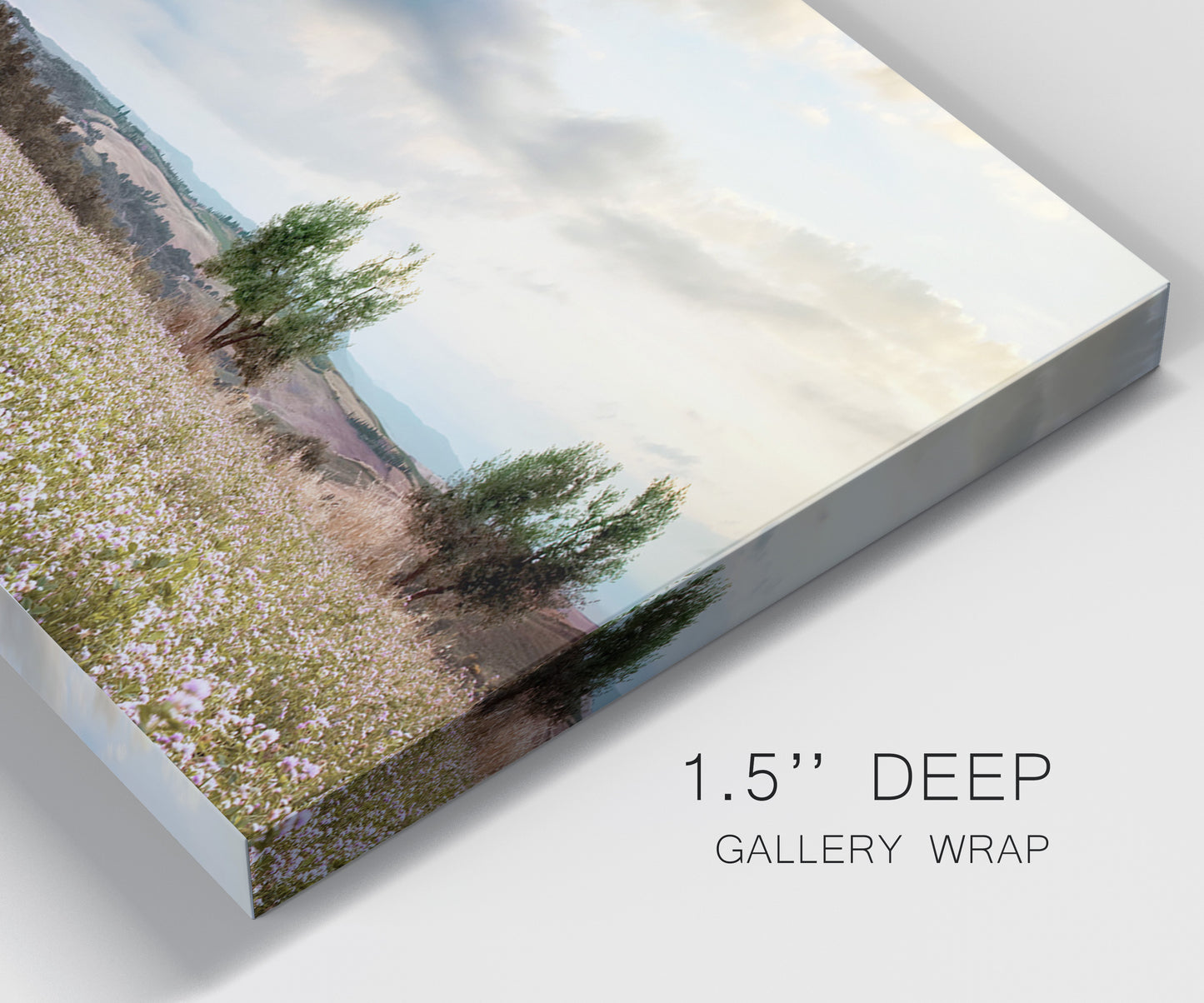 Close-up view of wrapped canvas corner featuring wildflowers across tuscan landscape.
