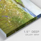 Close-up view of wrapped canvas corner featuring rugged coastal cliff landscape.