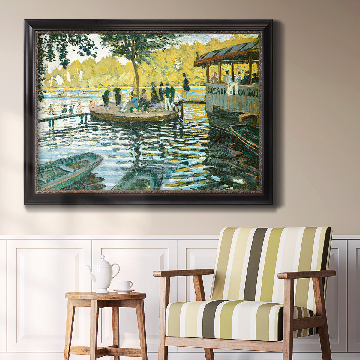 Impressionist riverside leisure scene by Claude Monet in an ornate black frame with gilded inner detail displayed in a light-toned interior setting.