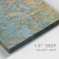 Close-up view of wrapped canvas corner featuring earthy copper toned abstract.