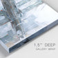 Close-up view of wrapped canvas corner featuring urban cityscape with architectural forms.