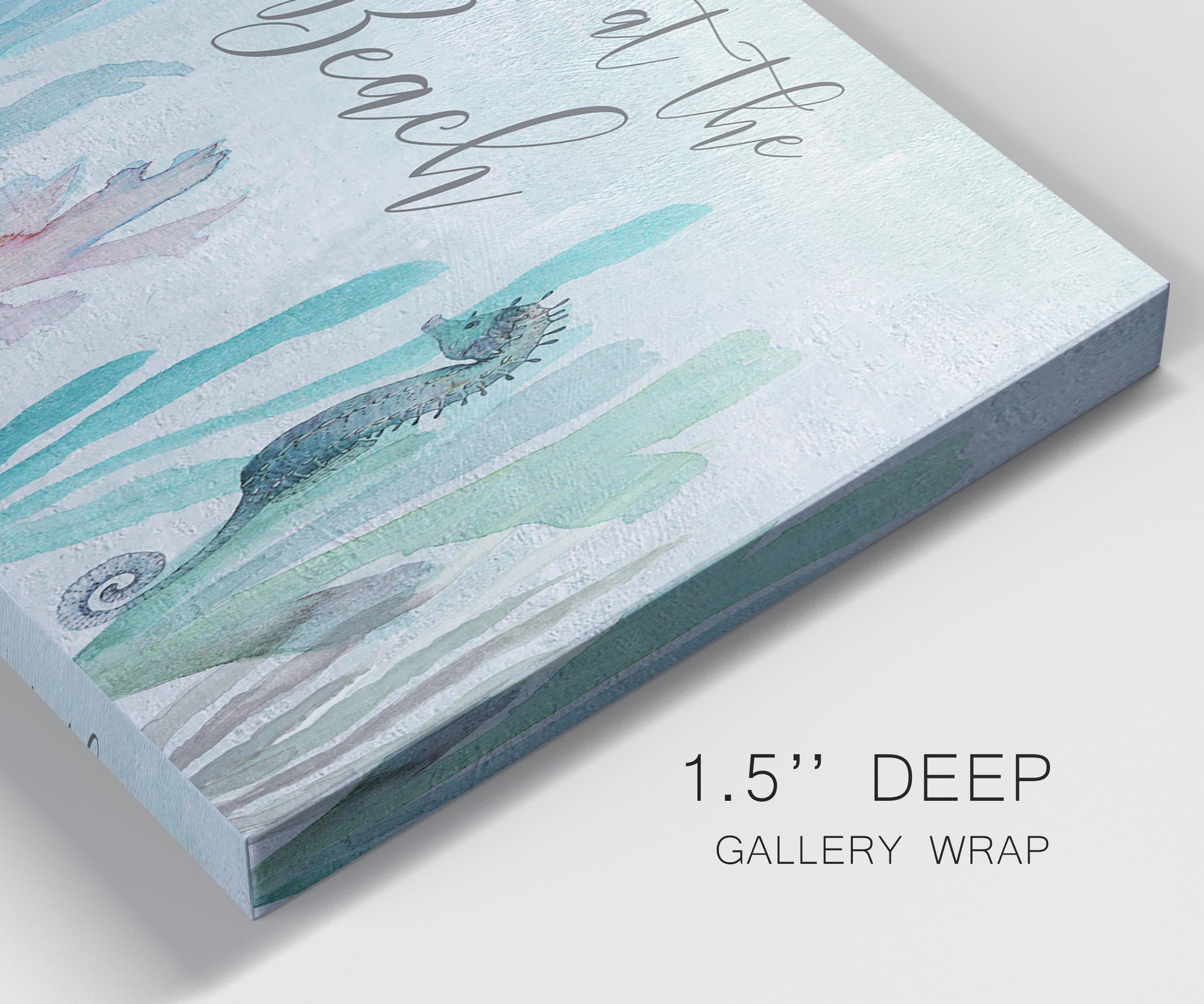 Close-up view of wrapped canvas corner featuring coastal typography with seahorses.