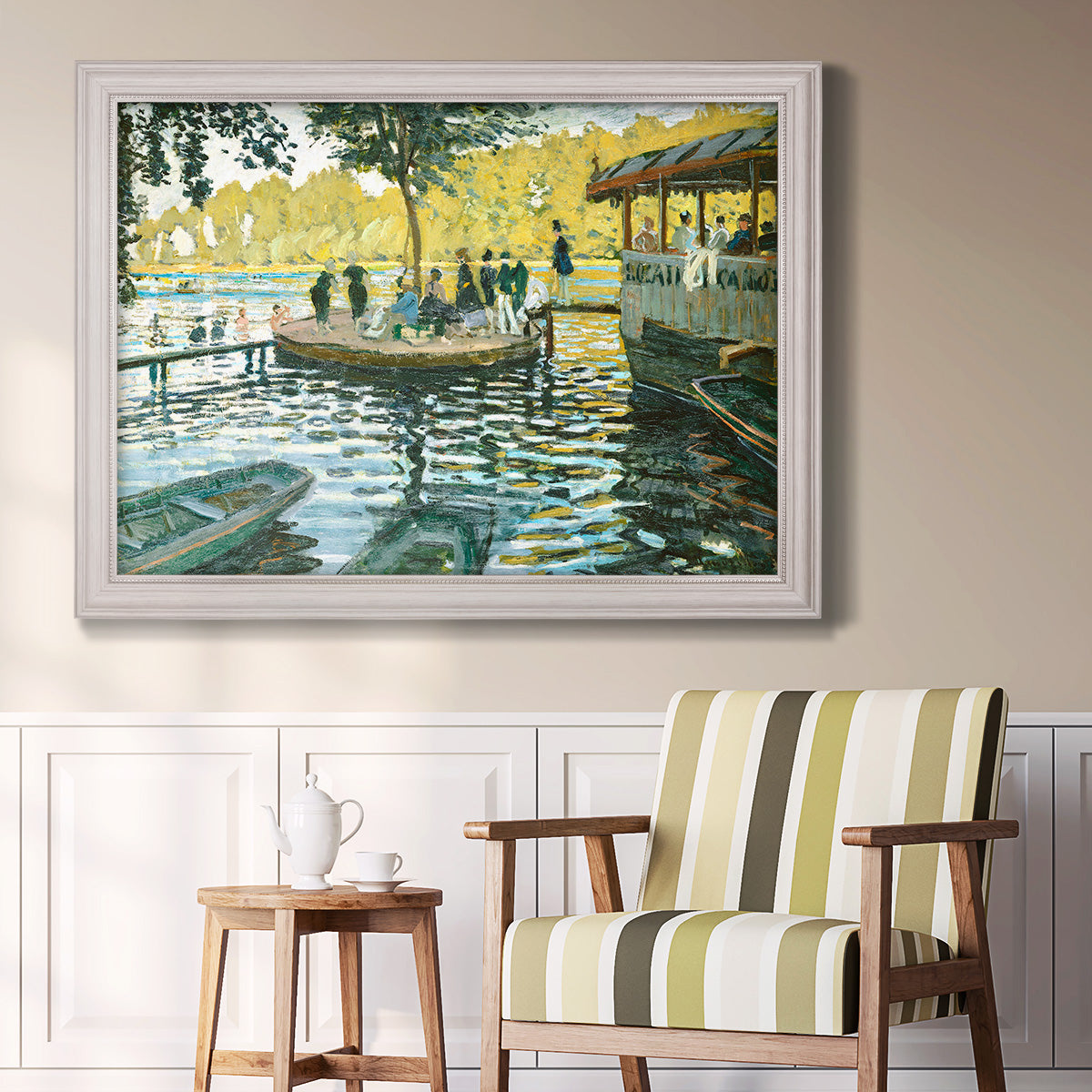 Impressionist riverside leisure scene by Claude Monet in an ornate weathered white frame displayed in a light-toned interior setting.