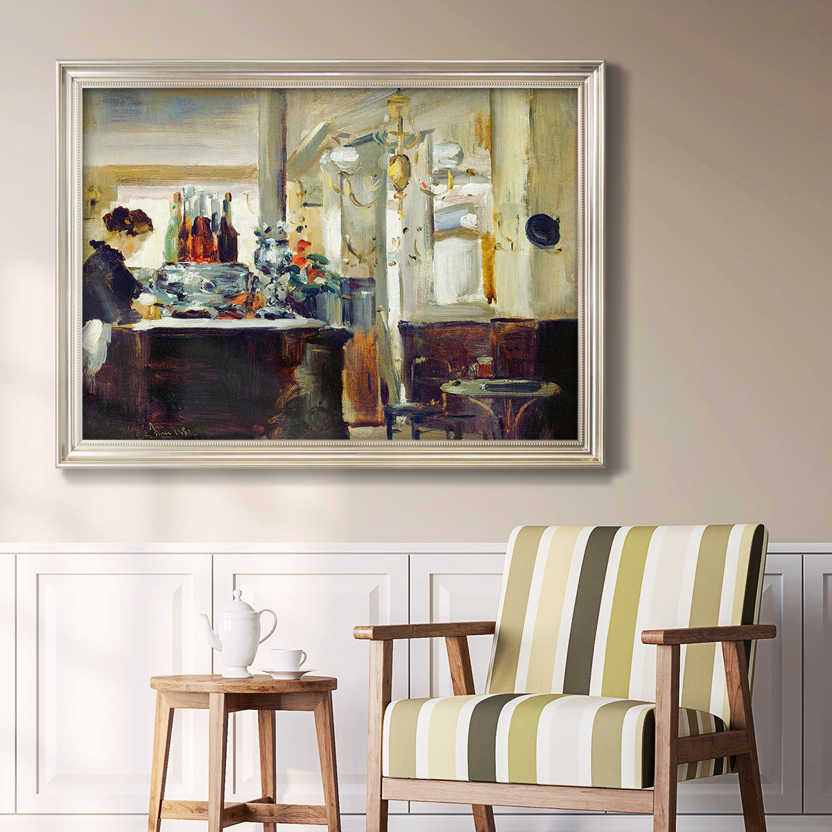 Impressionist café still life scene by Édouard Manet in an ornate champagne frame displayed in a light-toned interior setting.