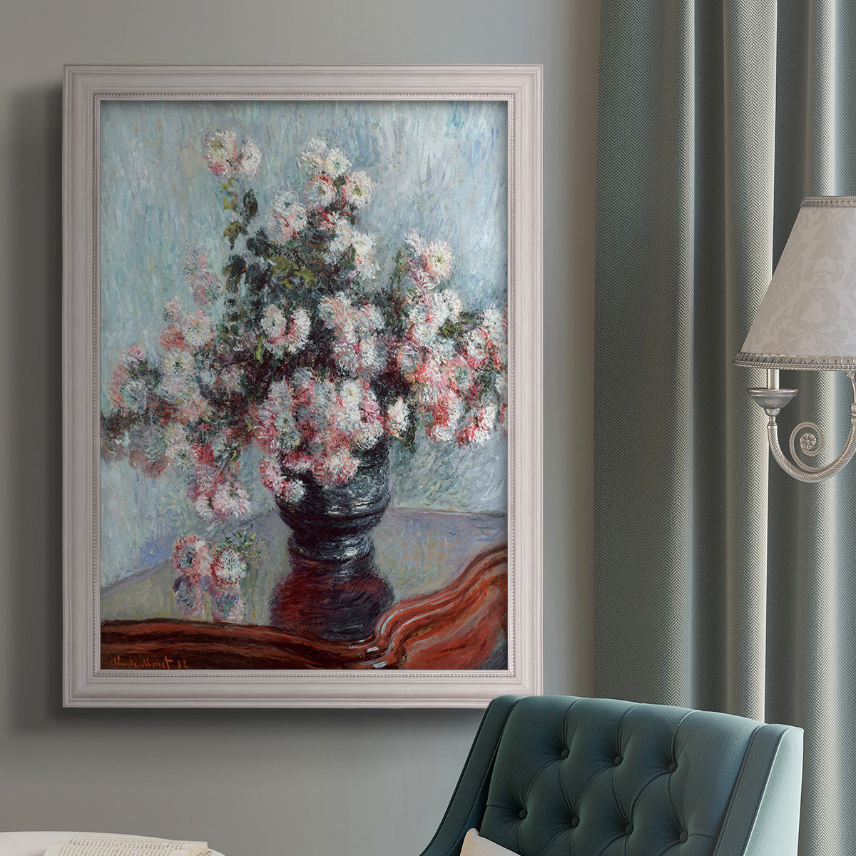 Impressionist chrysanthemum floral painting by Claude Monet in an {frame_style_descriptor} displayed in a neutral interior setting.