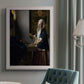 Quiet interior genre scene of a woman with scales by Johannes Vermeer in an {frame_style_descriptor} displayed in a neutral interior setting.