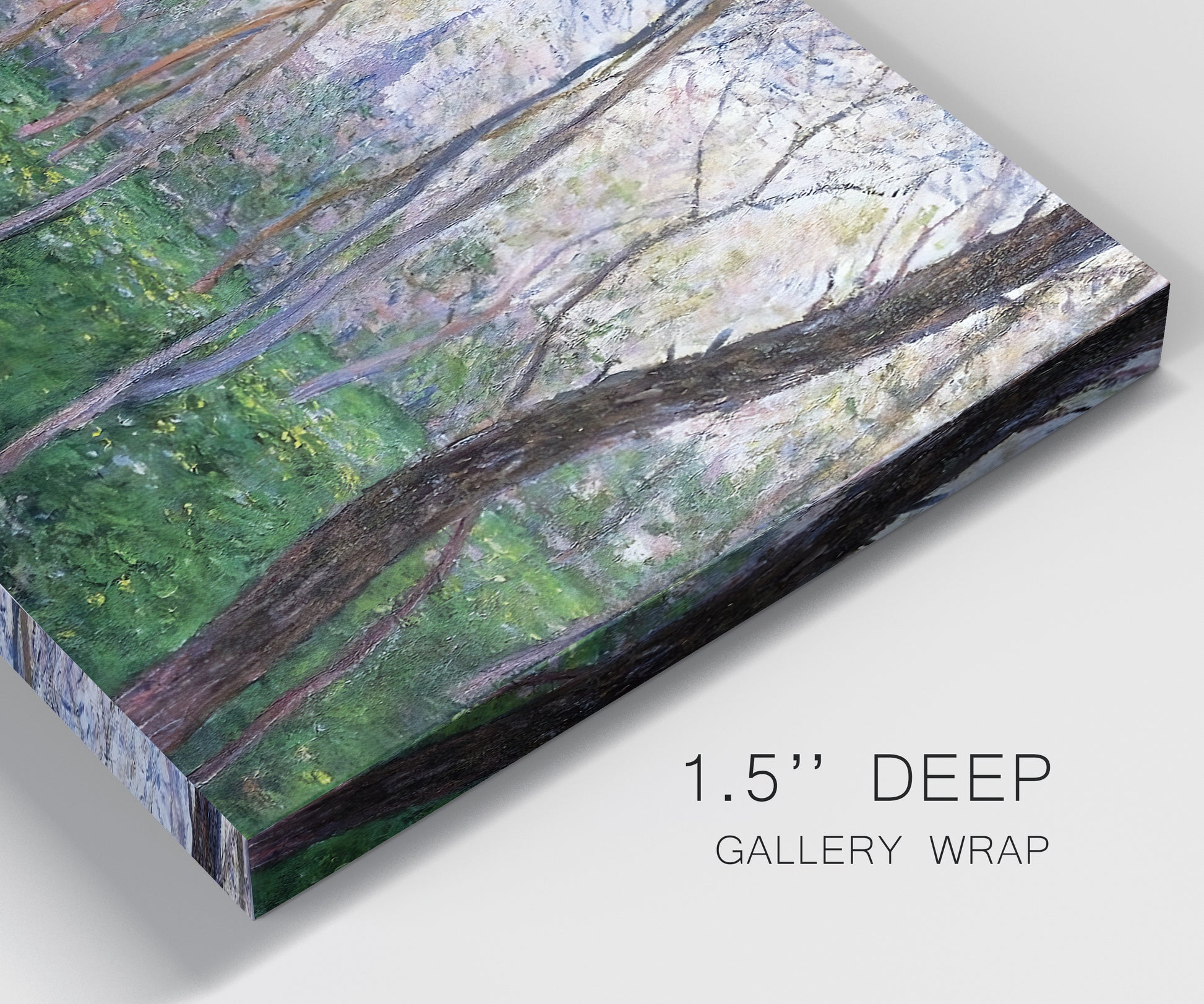 Close-up view of wrapped canvas corner featuring spring landscape along river.