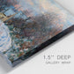 Close-up view of wrapped canvas corner featuring snow covered road leading to village.