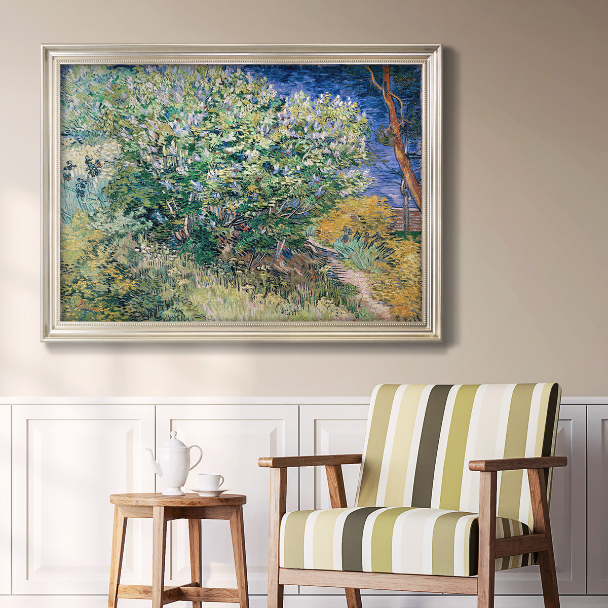 Impressionist lilac flower painting by Vincent van Gogh in an ornate champagne frame displayed in a light-toned interior setting.