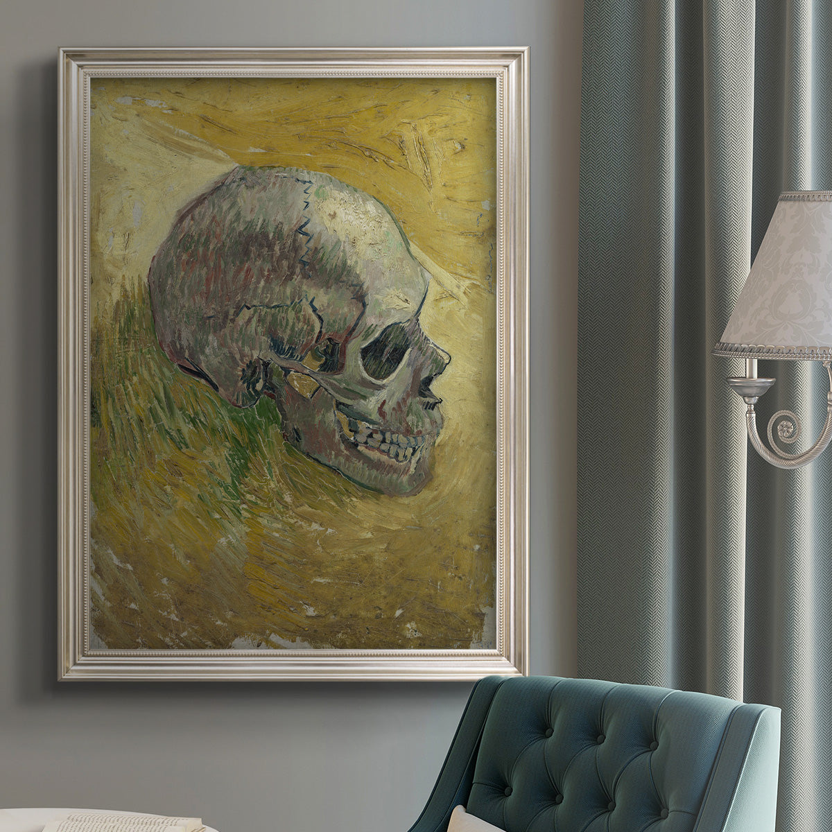 Profile skull study artwork by Vincent van Gogh in an {frame_style_descriptor} displayed in a neutral interior setting.