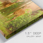 Close-up view of wrapped canvas corner featuring resting animals in open field.