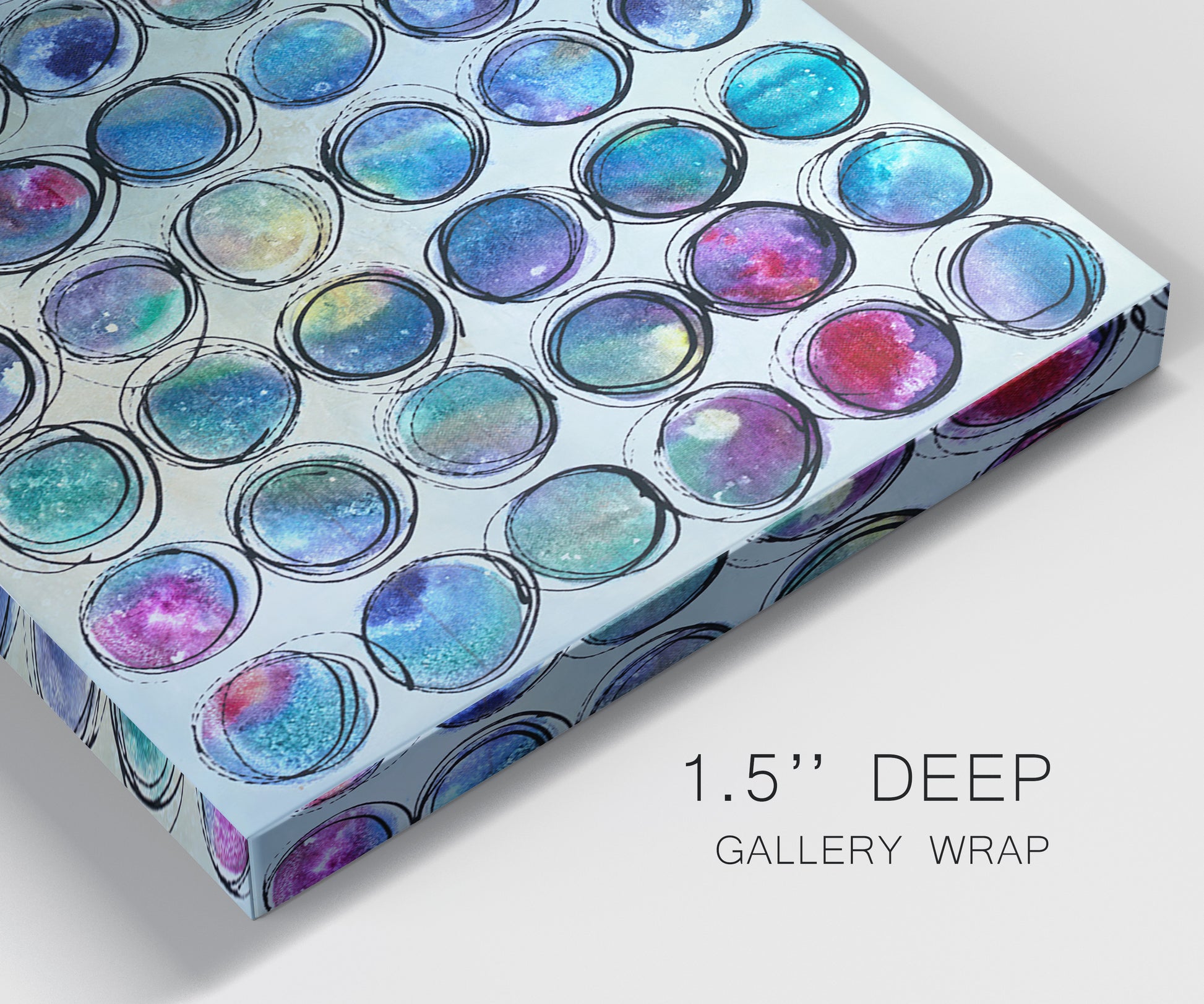 Close-up view of wrapped canvas corner featuring contrasting geometric abstract variations.