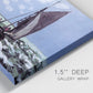 Close-up view of wrapped canvas corner featuring stormy sea with crashing waves.