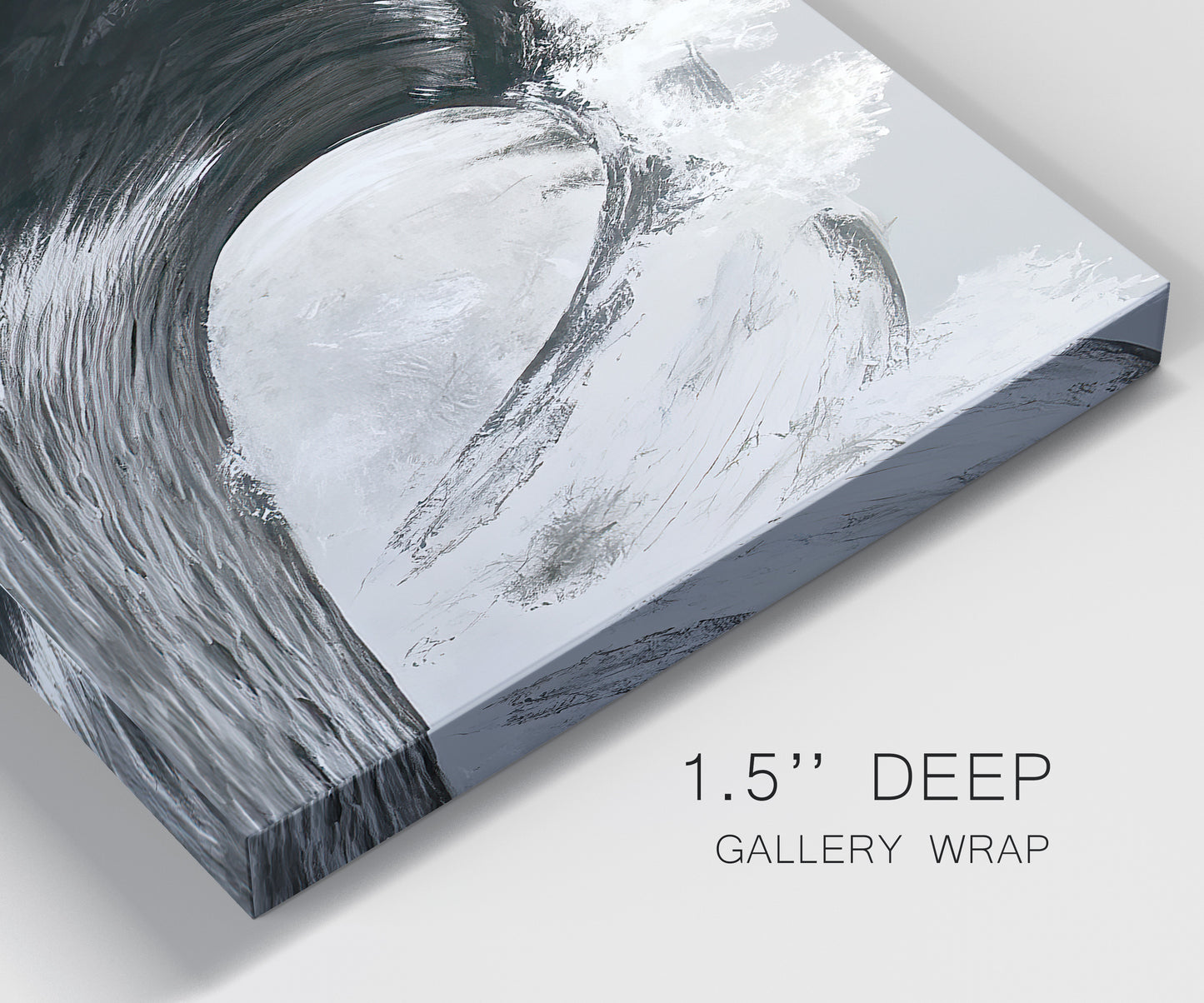 Close-up view of wrapped canvas corner featuring black and white crashing ocean waves.