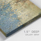 Close-up view of wrapped canvas corner featuring metallic abstract gold tones.