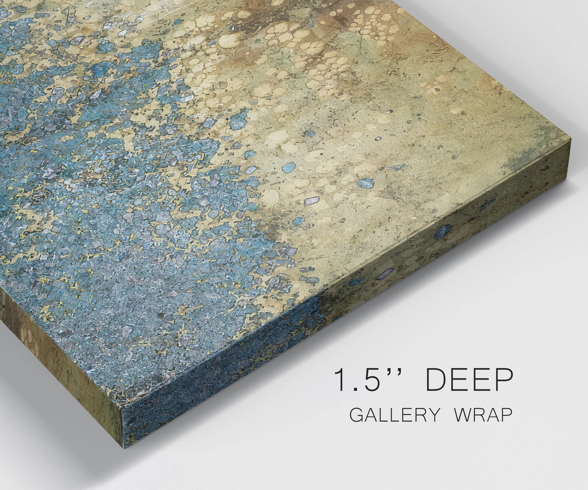 Close-up view of wrapped canvas corner featuring metallic abstract gold tones.