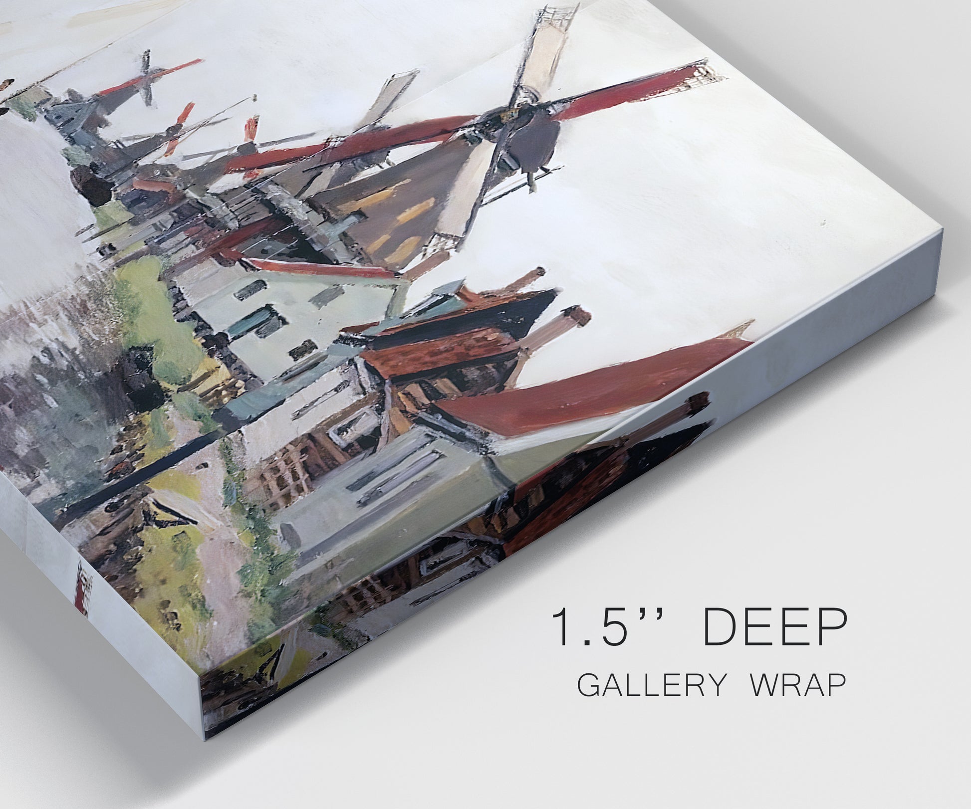 Close-up view of wrapped canvas corner featuring windmills beside calm water.