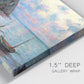 Close-up view of wrapped canvas corner featuring golden coastal sunset with cliffs.