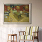 Impressionist interior of a night café by Vincent van Gogh in an ornate champagne frame displayed in a light-toned interior setting.
