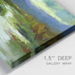 Close-up view of wrapped canvas corner featuring open meadow landscape with distant hills.