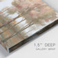 Close-up view of wrapped canvas corner featuring soft pastel park landscape scene.