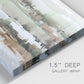 Close-up view of wrapped canvas corner featuring layered turquoise and earth tones abstract.