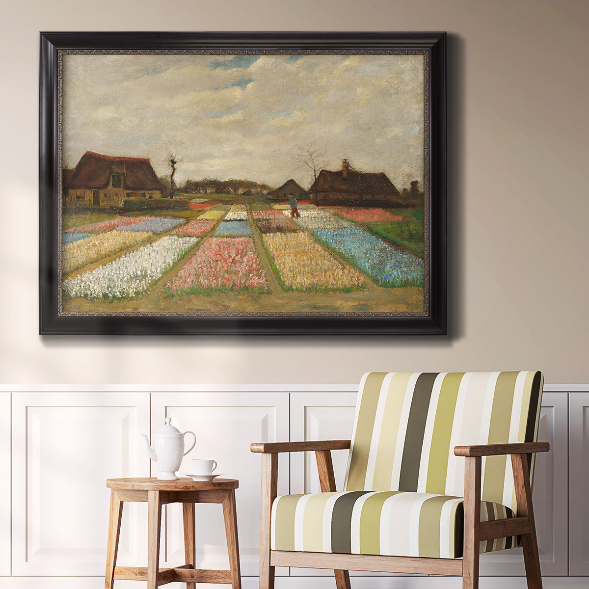 Impressionist Dutch bulb field landscape by Vincent van Gogh in an ornate black frame with gilded inner detail displayed in a light-toned interior setting.