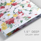 Close-up view of wrapped canvas corner featuring joyful spring floral composition.