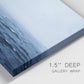 Close-up view of wrapped canvas corner featuring grayscale seascape with horizon.