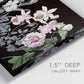 Close-up view of wrapped canvas corner featuring early spring blossoms in soft tones.