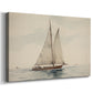 Sailboat gliding across calm waters under a cloudy sky during daytime in a coastal setting