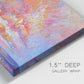 Close-up view of wrapped canvas corner featuring peaceful tropical inspired landscape.