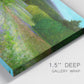 Close-up view of wrapped canvas corner featuring fresh spring meadow landscape.
