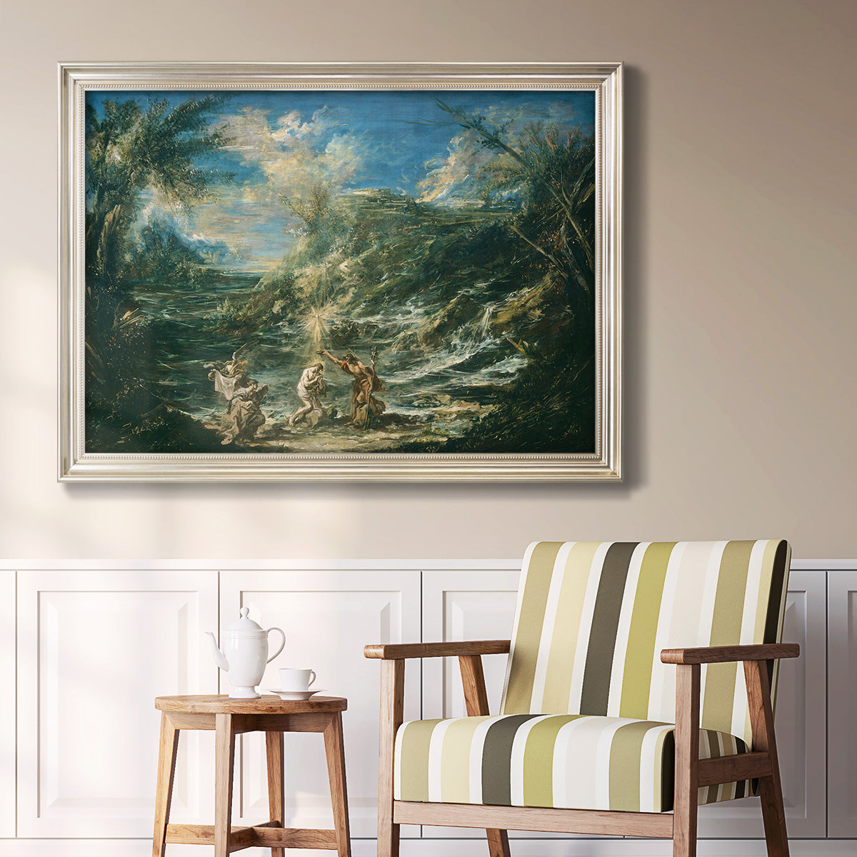 Religious landscape depicting the baptism of Christ by Alessandro Magnasco in an ornate champagne frame displayed in a light-toned interior setting.