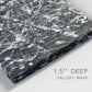 Close-up view of wrapped canvas corner featuring energetic expressionist abstract splatter.