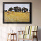 Impressionist rural harvest scene by John Singer Sargent in an ornate black frame with gilded inner detail displayed in a light-toned interior setting.