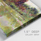 Close-up view of wrapped canvas corner featuring arched rose garden walkway.