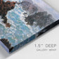 Close-up view of wrapped canvas corner featuring storm waves battering rocky coast.