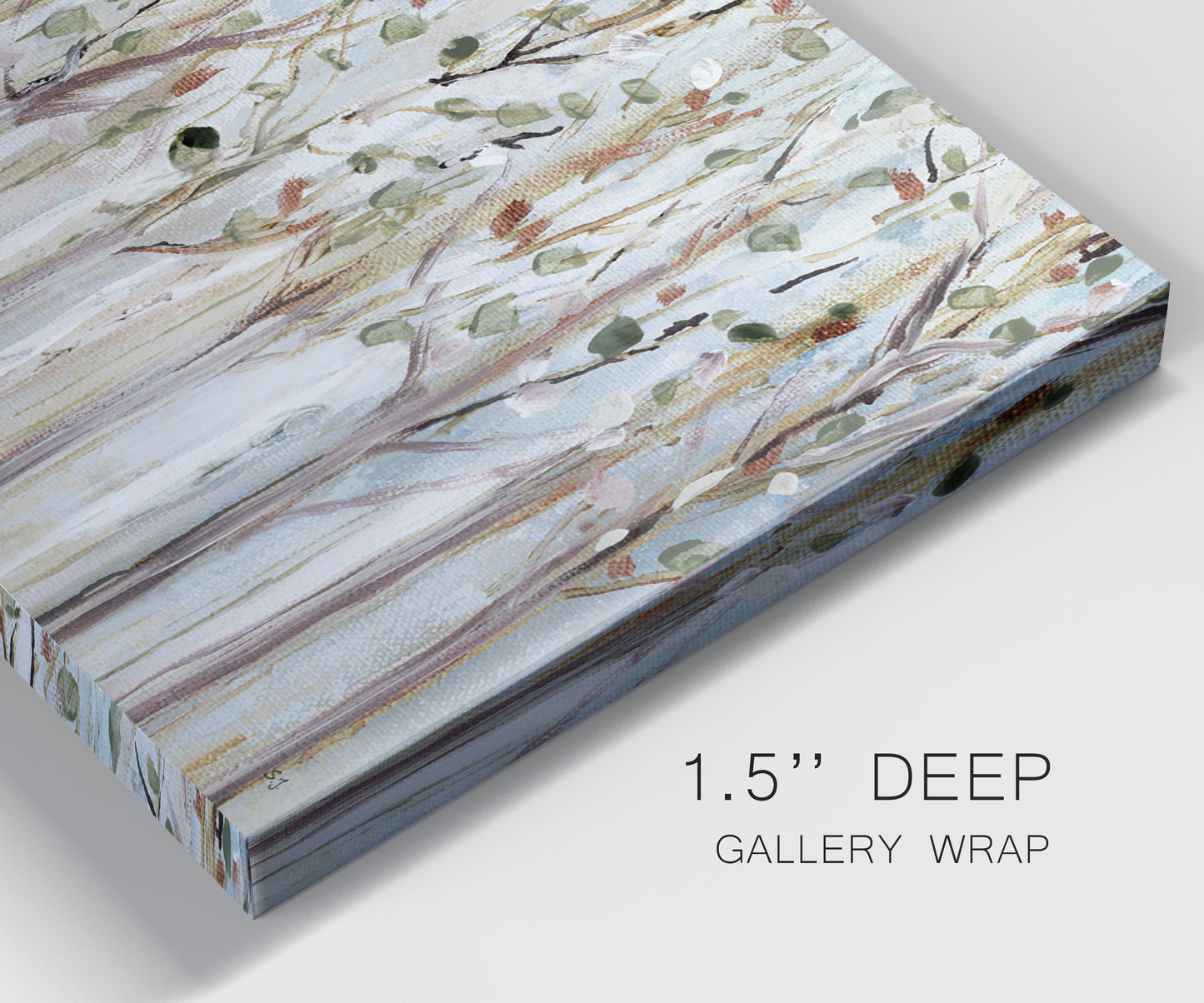 Close-up view of wrapped canvas corner featuring bare birch trees in winter forest.